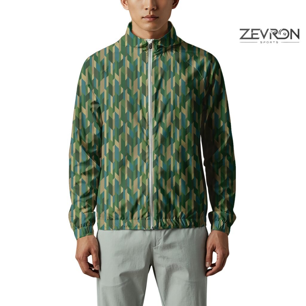 Man in a green and tan geometric patterned Zevron Sports zip-up running jacket.