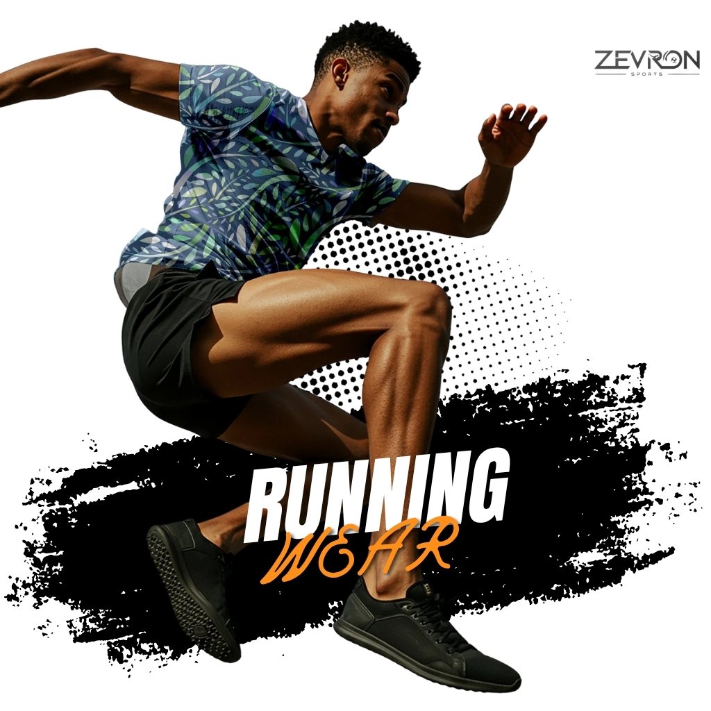 Male athlete jogging in a white Zevron Sports performance t-shirt and blue running shorts.