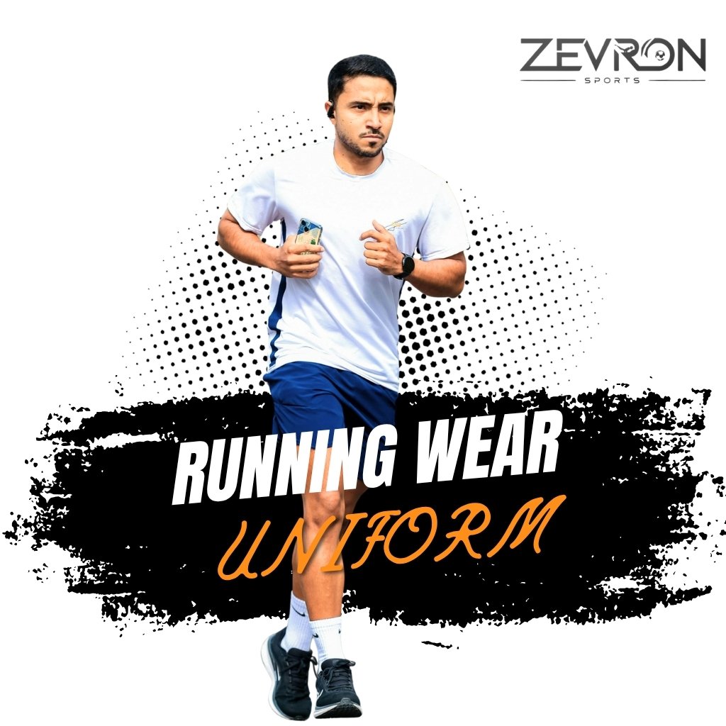 Male athlete jogging in a white Zevron Sports performance t-shirt and blue running shorts.